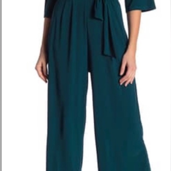 SuperFoxx Teal Faux Wrap pleated front stretch 3/4 sleeve jumpsuit - Picture 4 of 17